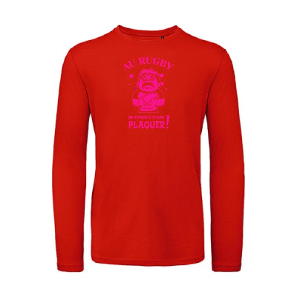 Au rugby, on apprend à se faire plaquer ! Rose Fluo |T-shirt bio manches longues